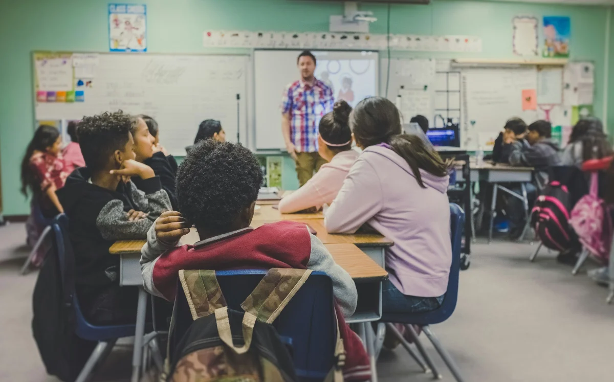 Students sitting together in an inclusive classroom setting