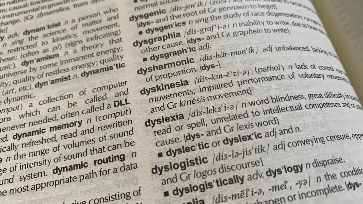 Close-up of the word 'Dyslexia' in a dictionary, highlighting the definition.