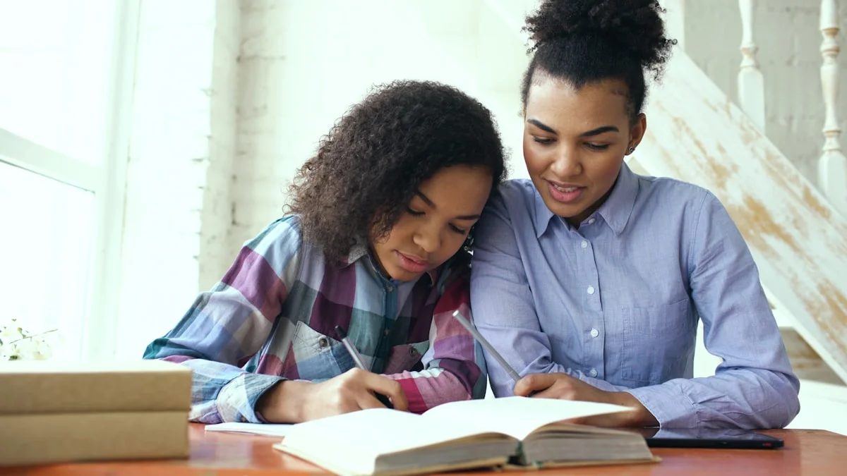 Mother and daughter studying together at a table