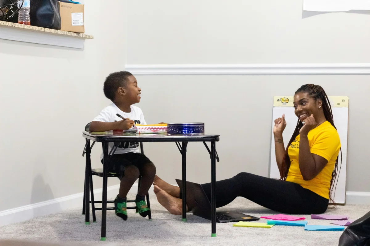 Parent helping child with homework in Houston special education
