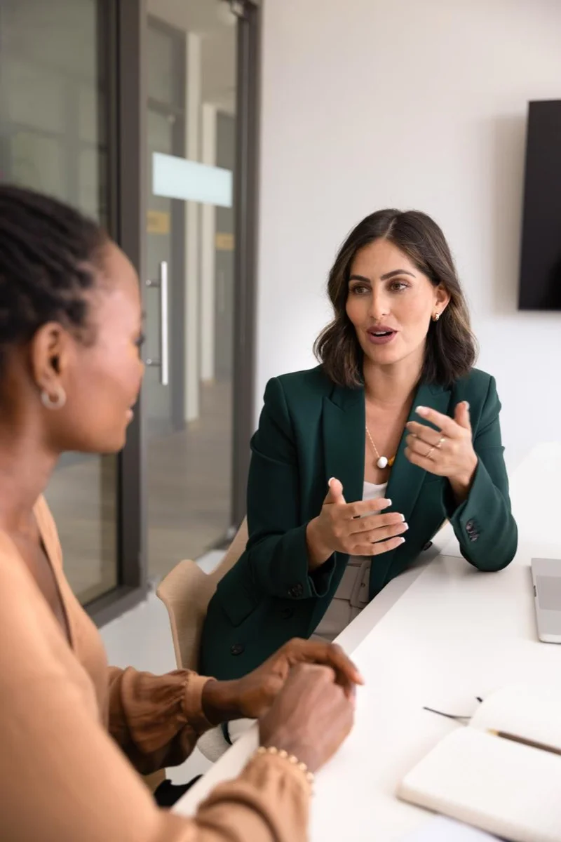 Parent and advocate reviewing an IEP document together